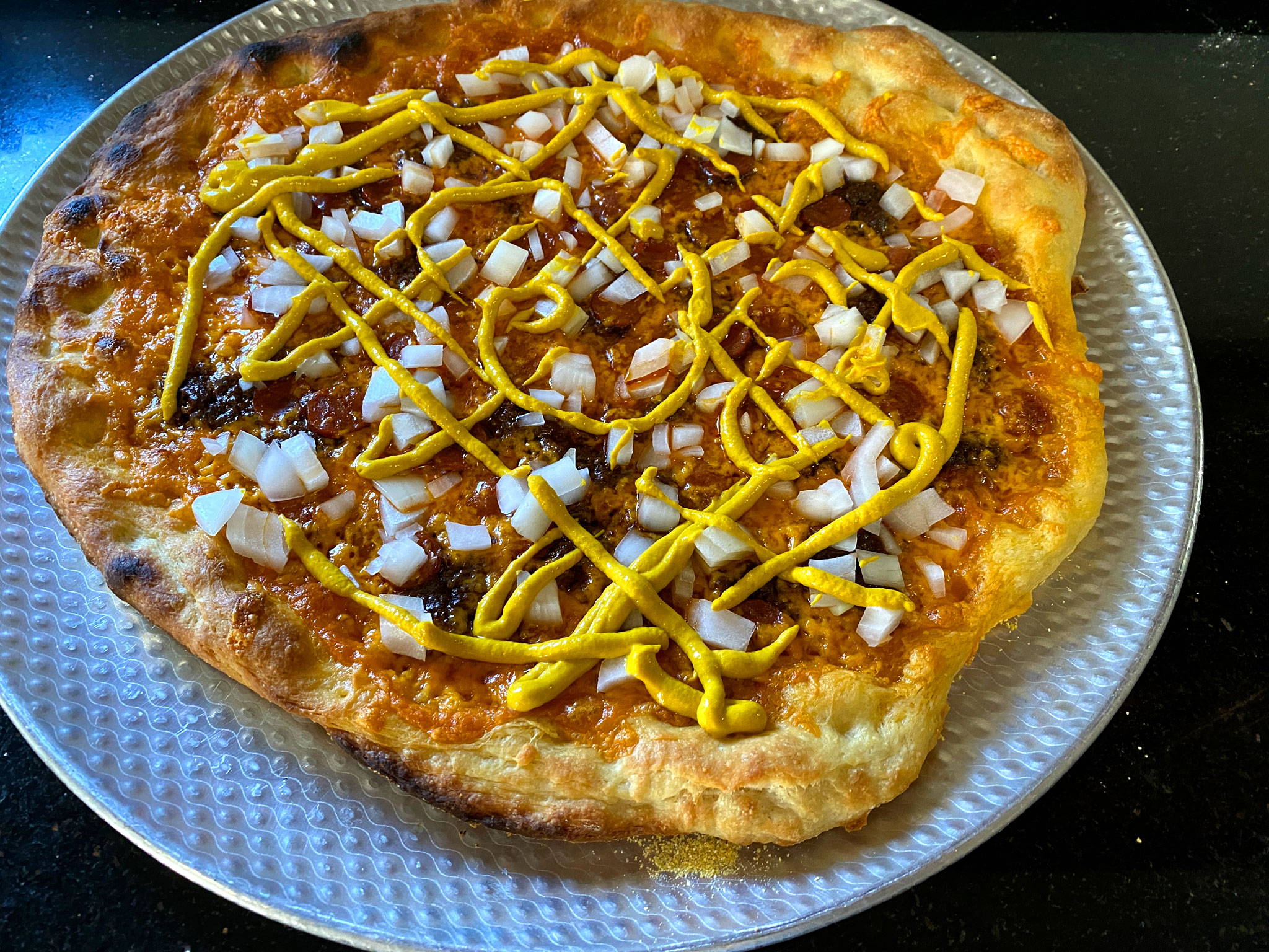 Coney Island Chili Dog Pizza - Sargento Shredded Cheddar Cheese, Hebrew National Kosher Beef Franks, Skyline Beef Chili (no beans), Diced White Onion, French's Yellow Mustard